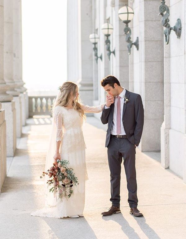 Bride in white wedding dress with groom